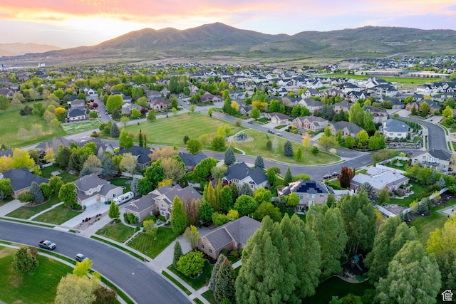 6208 W Bull River Rd, Highland, UT 84003 - aerial view of property and surrounding area with a mountain backdrop and nearby suburban area