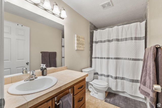 6208 W Bull River Rd, Highland, UT 84003 - bathroom featuring tile patterned floors, toilet, vanity, a shower with curtain, and a textured ceiling