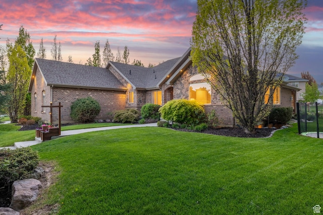 6208 W Bull River Rd, Highland, UT 84003 - view of front facade featuring a front lawn, brick siding, and roof with shingles