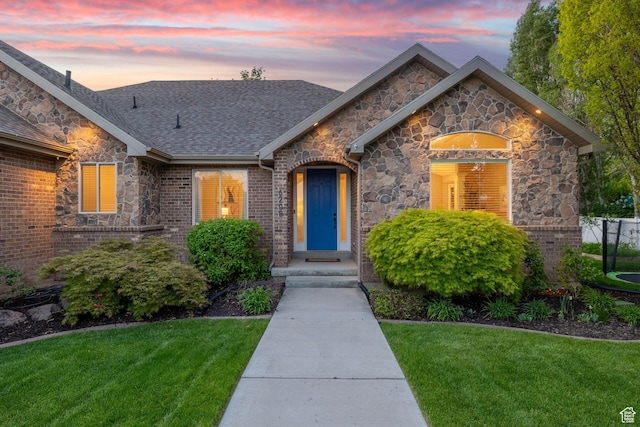 6208 W Bull River Rd, Highland, UT 84003 - view of front of home with a yard and stone siding