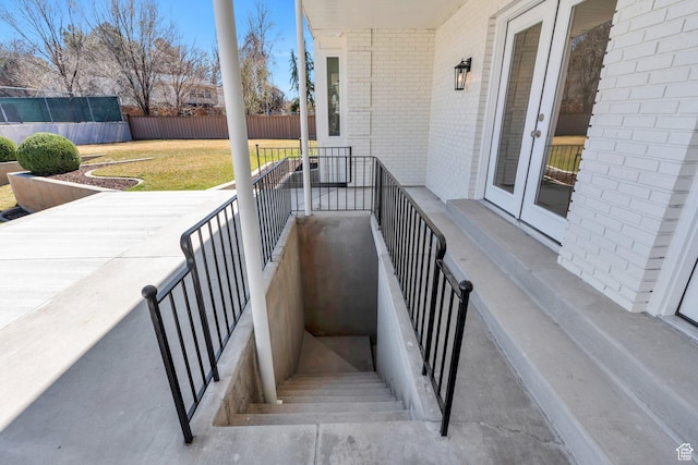 881 S 635 W, Orem, UT 84058 - view of patio / terrace with a balcony, fence, and french doors