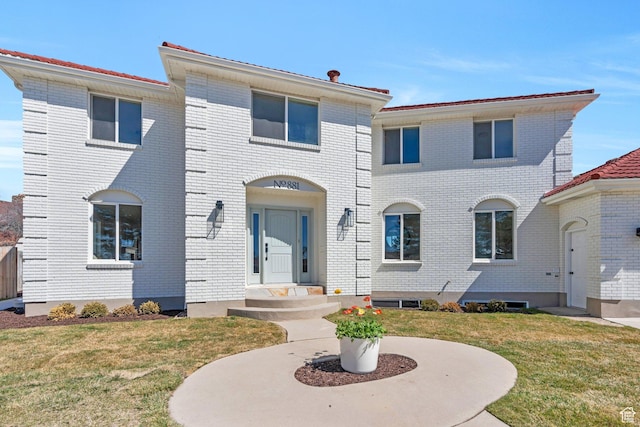881 S 635 W, Orem, UT 84058 - view of front of home featuring brick siding and a front lawn