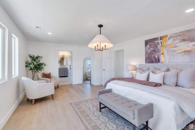 881 S 635 W, Orem, UT 84058 - bedroom featuring light wood-type flooring, baseboards, visible vents, arched walkways, and recessed lighting