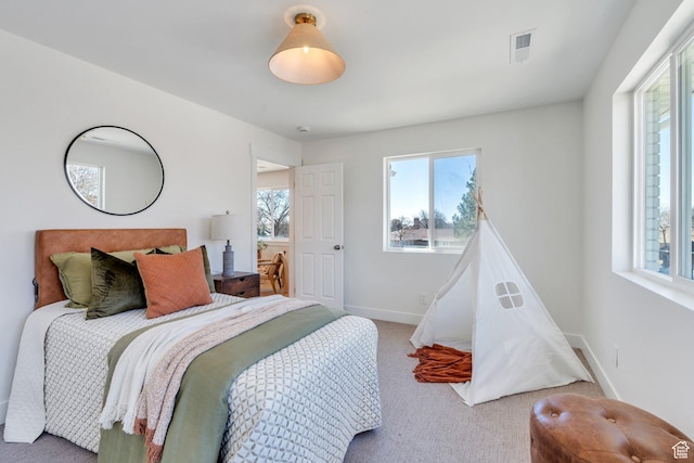 881 S 635 W, Orem, UT 84058 - bedroom featuring carpet flooring, baseboards, multiple windows, and visible vents