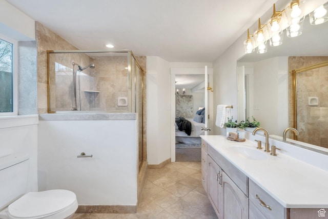 881 S 635 W, Orem, UT 84058 - full bathroom featuring connected bathroom, a stall shower, toilet, vanity, and tile patterned flooring