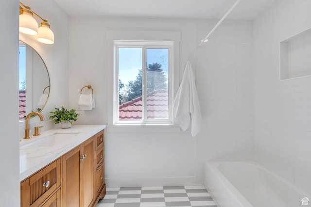 881 S 635 W, Orem, UT 84058 - bathroom featuring tile patterned floors, shower / bathing tub combination, baseboards, and vanity