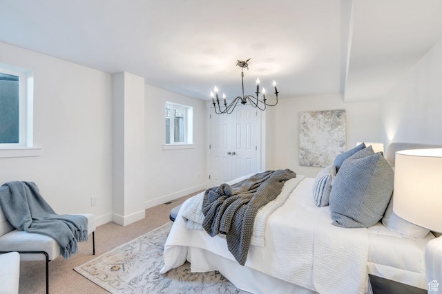 881 S 635 W, Orem, UT 84058 - carpeted bedroom with baseboards and an inviting chandelier
