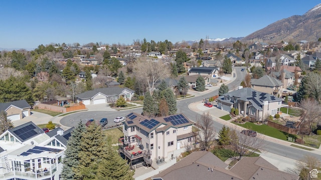 drone / aerial view featuring a mountain view and a residential view