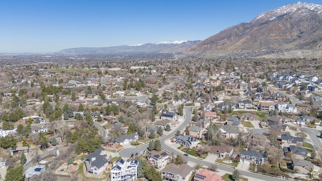 drone / aerial view with a residential view and a mountain view
