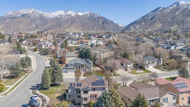 drone / aerial view with a mountain view and a residential view