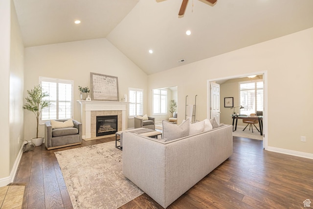 1886 S 830 W Unit D, Syracuse, UT 84075 - living area with dark wood-type flooring, a wealth of natural light, a tile fireplace, and ceiling fan