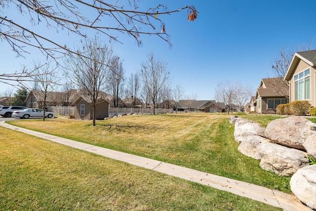 1886 S 830 W Unit D, Syracuse, UT 84075 - view of yard featuring a residential view and fence