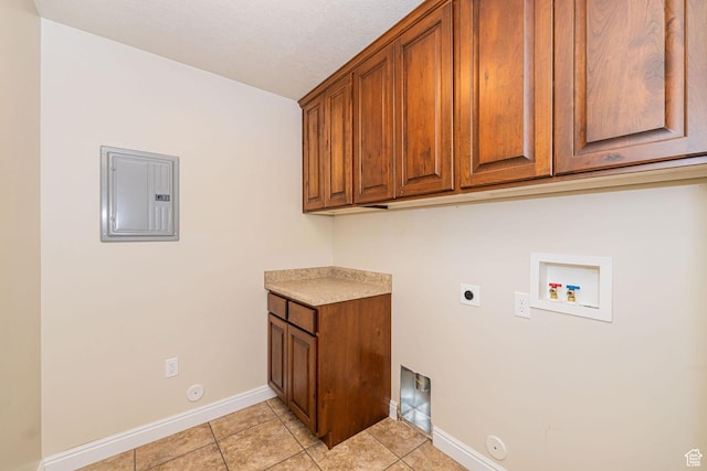 1886 S 830 W Unit D, Syracuse, UT 84075 - washroom featuring hookup for an electric dryer, hookup for a gas dryer, washer hookup, light tile patterned floors, and electric panel