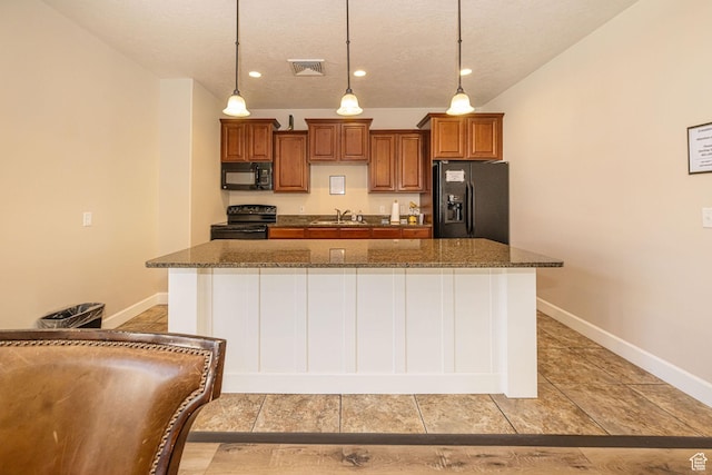 1886 S 830 W Unit D, Syracuse, UT 84075 - kitchen featuring visible vents, brown cabinets, a sink, black appliances, and a center island