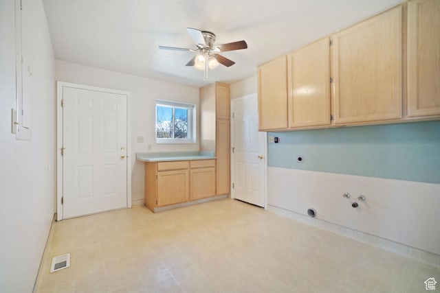 laundry room with hookup for a washing machine, ceiling fan, light floors, electric dryer hookup, and cabinet space