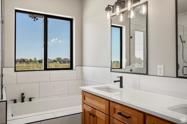 2833 N 3475 W, Plain City, UT 84404 - bathroom with double vanity, healthy amount of natural light, and a bath