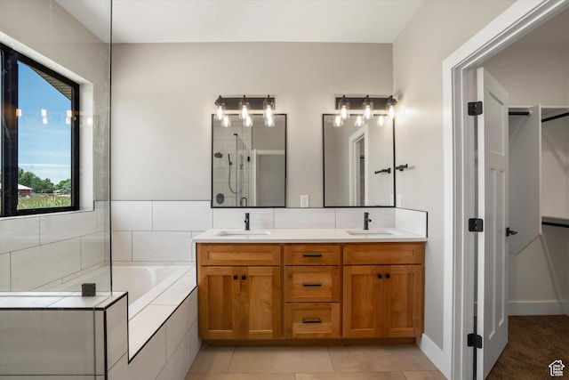 2833 N 3475 W, Plain City, UT 84404 - bathroom featuring double vanity, a garden tub, a tile shower, and tile patterned floors