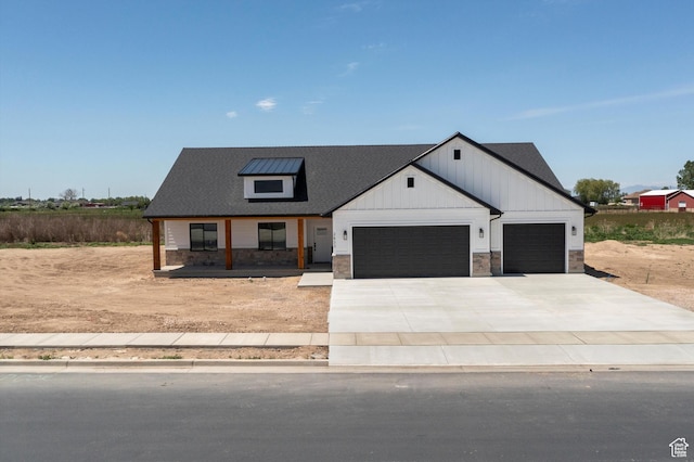 2833 N 3475 W, Plain City, UT 84404 - modern inspired farmhouse with an attached garage, stone siding, driveway, and board and batten siding