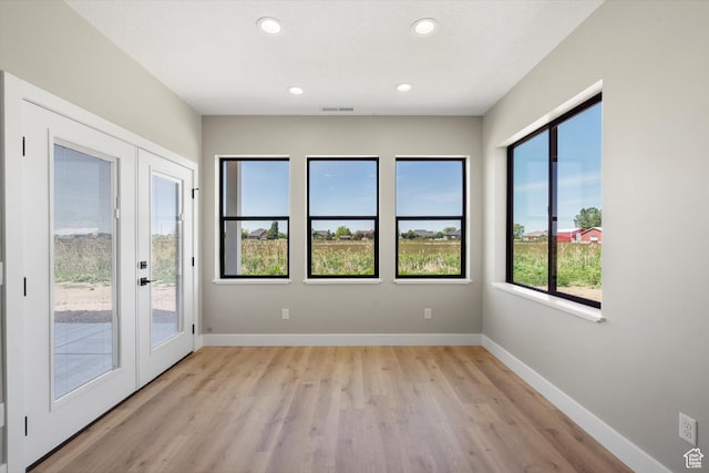 2833 N 3475 W, Plain City, UT 84404 - empty room with light wood-style floors, baseboards, and recessed lighting