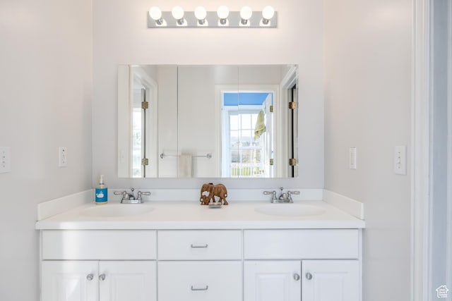 67 E Dorchester Dr, Salt Lake City, UT 84103 - bathroom featuring double vanity and a sink
