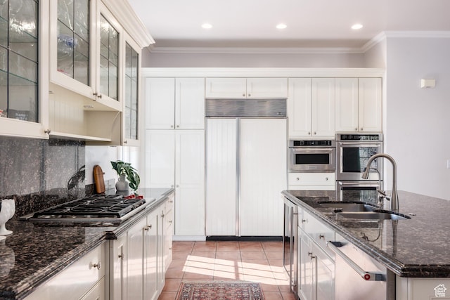 67 E Dorchester Dr, Salt Lake City, UT 84103 - kitchen with ornamental molding, a sink, stainless steel appliances, and light tile patterned floors