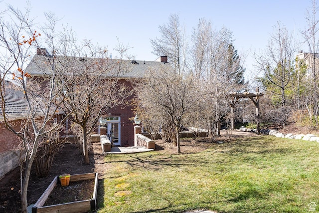 67 E Dorchester Dr, Salt Lake City, UT 84103 - view of yard with a vegetable garden