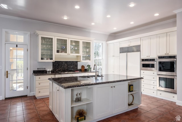 67 E Dorchester Dr, Salt Lake City, UT 84103 - kitchen with a healthy amount of sunlight, stainless steel appliances, a sink, and open shelves