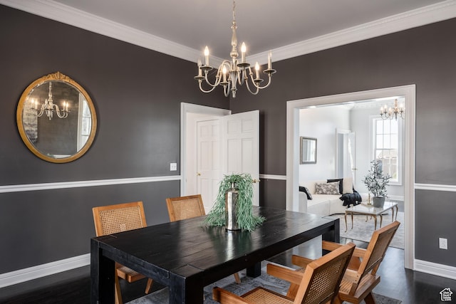 67 E Dorchester Dr, Salt Lake City, UT 84103 - dining space featuring dark wood-type flooring, baseboards, an inviting chandelier, and crown molding