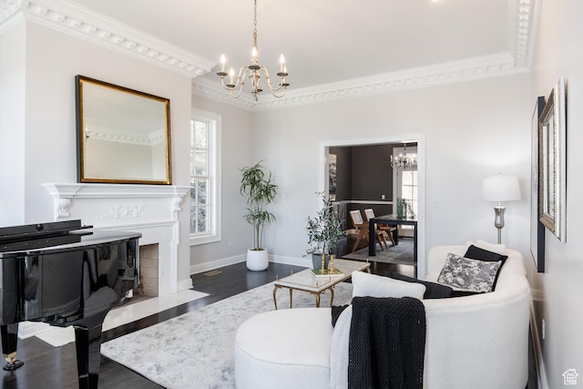 67 E Dorchester Dr, Salt Lake City, UT 84103 - living area with baseboards, wood finished floors, an inviting chandelier, and crown molding