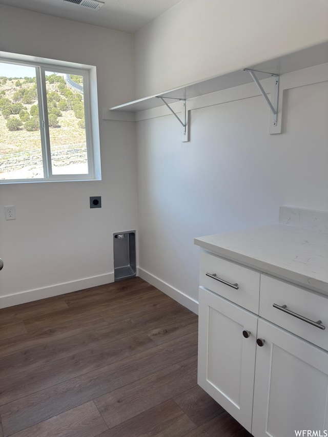 7326 N Long Ridge Dr Unit 614, Eagle Mountain, UT 84005 - laundry room featuring electric dryer hookup, dark wood-style flooring, and baseboards