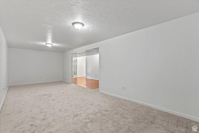 379 S Utah Dr, Grantsville, UT 84029 - unfurnished room featuring baseboards, carpet flooring, and a textured ceiling