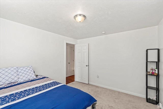 379 S Utah Dr, Grantsville, UT 84029 - bedroom featuring baseboards, carpet floors, and a textured ceiling