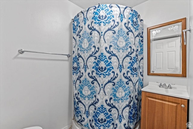 379 S Utah Dr, Grantsville, UT 84029 - bathroom featuring toilet, vanity, and curtained shower