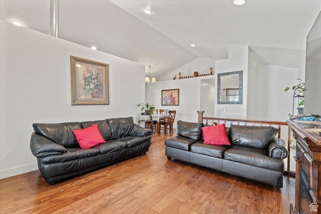 379 S Utah Dr, Grantsville, UT 84029 - living area with baseboards, lofted ceiling, a chandelier, and wood finished floors