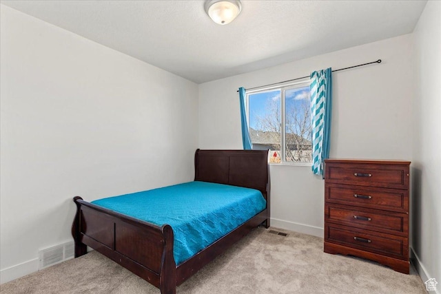 379 S Utah Dr, Grantsville, UT 84029 - bedroom featuring light colored carpet, visible vents, and baseboards
