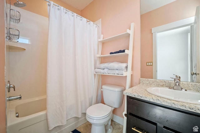 full bath featuring toilet, vanity, tile patterned flooring, shower / bath combo with shower curtain, and baseboards