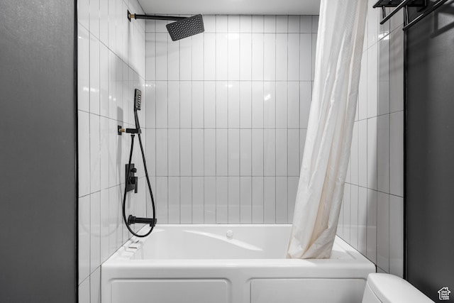 bathroom with toilet and shower / bathtub combination with curtain