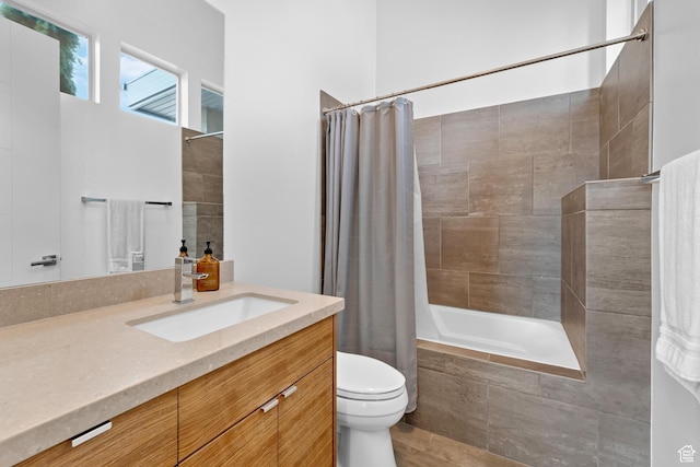 4601 N Toscana Hills Dr, Lehi, UT 84043 - full bathroom with toilet, vanity, and tiled shower / bath
