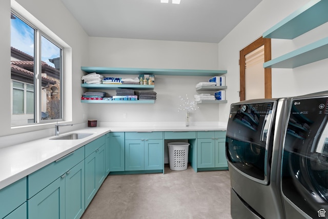 4601 N Toscana Hills Dr, Lehi, UT 84043 - clothes washing area featuring independent washer and dryer, cabinet space, and a sink