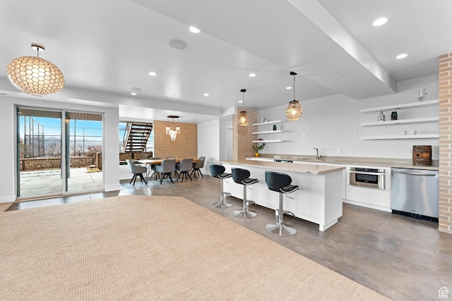 4601 N Toscana Hills Dr, Lehi, UT 84043 - kitchen featuring finished concrete flooring, stainless steel appliances, a sink, and open shelves