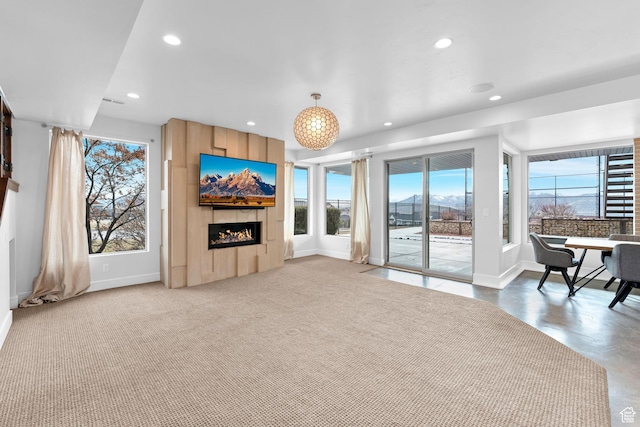 4601 N Toscana Hills Dr, Lehi, UT 84043 - living area with baseboards, a lit fireplace, and recessed lighting