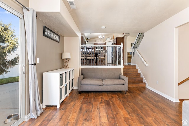 6874 S Hoyle Cir, West Jordan, UT 84081 - interior space with stairway, baseboards, visible vents, a notable chandelier, and wood finished floors
