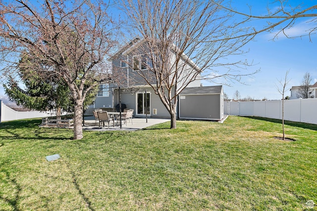 6874 S Hoyle Cir, West Jordan, UT 84081 - view of yard featuring a fenced backyard, a patio, an outdoor structure, and a storage shed