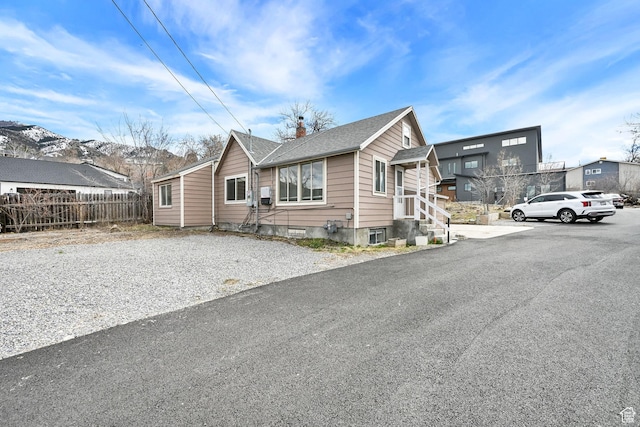 150 E 200 S, Providence, UT 84332 - bungalow-style house featuring roof with shingles and fence