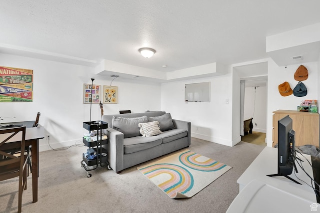 150 E 200 S, Providence, UT 84332 - living area with a textured ceiling, carpet flooring, baseboards, and visible vents