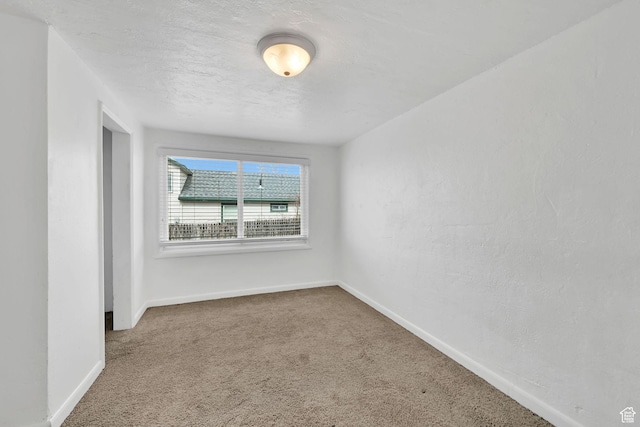 150 E 200 S, Providence, UT 84332 - carpeted empty room with baseboards