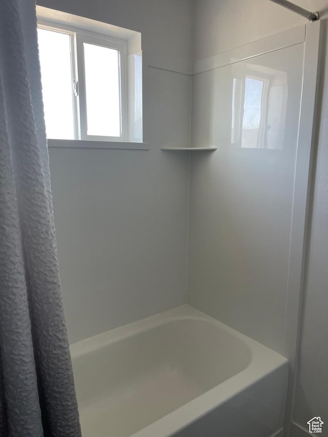 4937 E Lake Dr, Eagle Mountain, UT 84005 - full bathroom featuring shower / tub combo