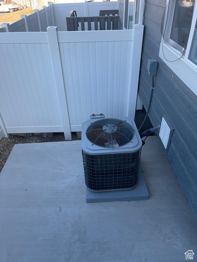 4937 E Lake Dr, Eagle Mountain, UT 84005 - exterior details with central air condition unit and fence