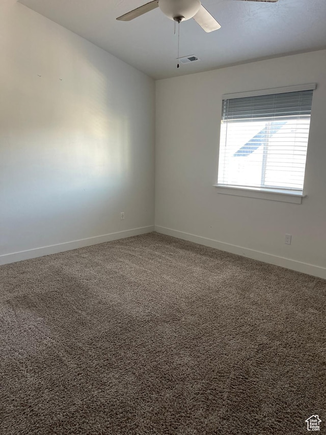 4937 E Lake Dr, Eagle Mountain, UT 84005 - carpeted empty room with baseboards, visible vents, and ceiling fan