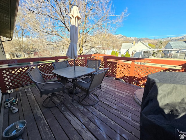 243 Downs Cir, Ogden, UT 84404 - deck with area for grilling, outdoor dining area, and a mountain view